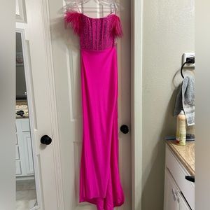 Sherri Hill Hot pink with feathers and lace back dress. Size 00